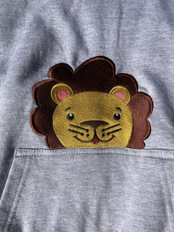 Lion Peeking Hoody 9-11 years - Image 2